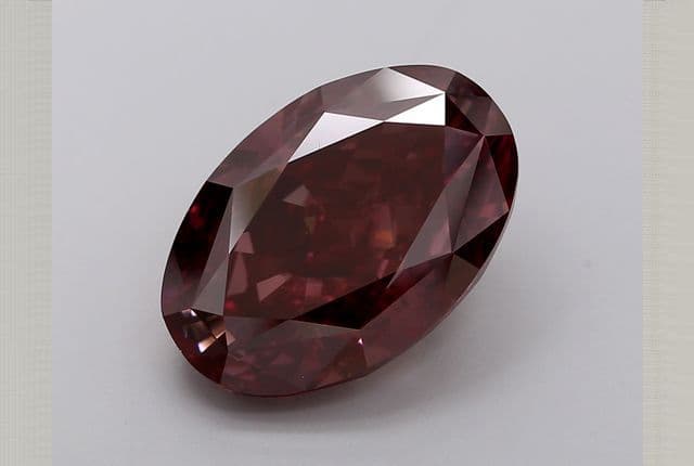 10.52ct | Oval | FANCY | VS1 | Good