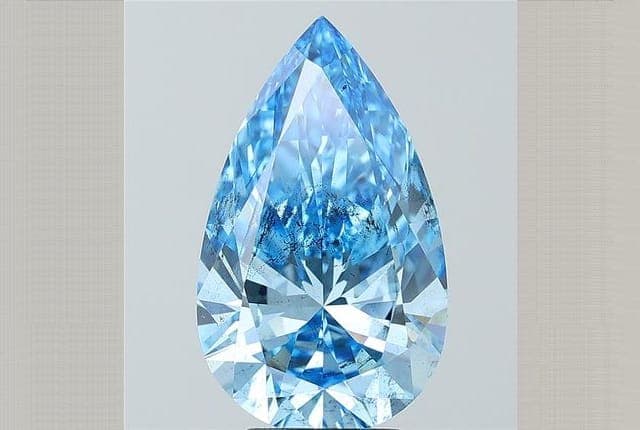 IGI | 5.03ct | Pear | FANCY | SI2 | Very Good