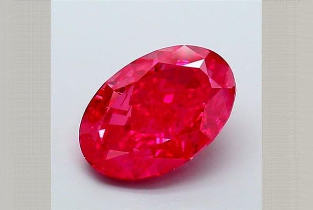 IGI | 6.37ct | Oval | FANCY | VVS2 | Very Good