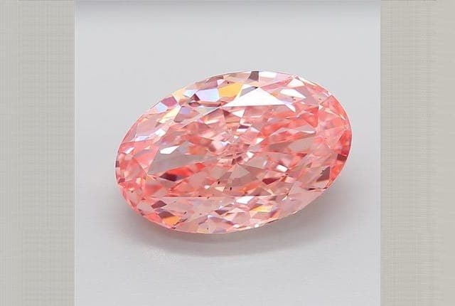 IGI | 14.03ct | Oval | FANCY | VS2 | Very Good
