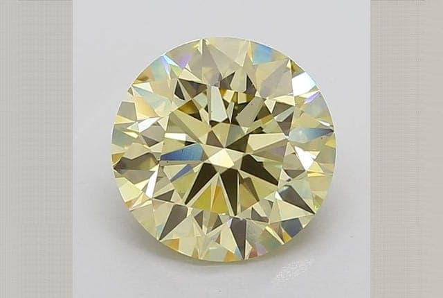 IGI | 6.31ct | Round | FANCY | VS1 | Ideal
