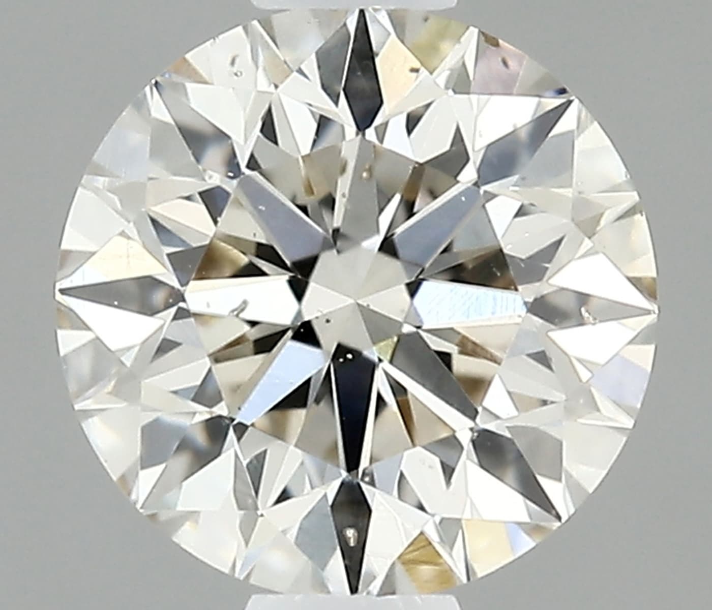 IGI | 0.61ct | Round | K | SI1 | Excellent